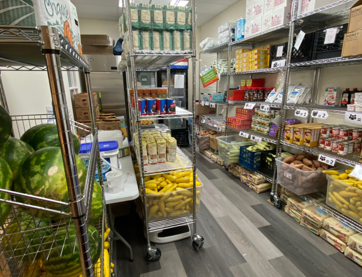 Photo of NSC's food pantry, stocked with fresh produce and dry goods