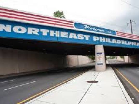 A bridge welcomes the family to Philadelphia.