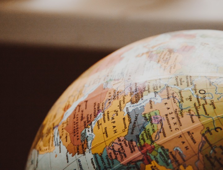 image of part of a globe in non-latin script Photo by NastyaSensei: https://www.pexels.com/photo/close-up-of-globe-335393/